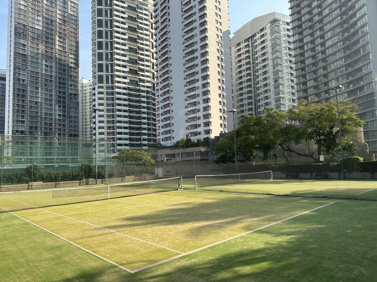 President Park grass tennis courts surrounded by the towers